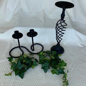 Bundle of iron-type candleholders and faux ivy embellishment
